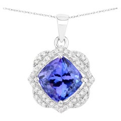 Ciondolo con tanzanite naturale e diamanti 3,10 carati in oro bianco 14K