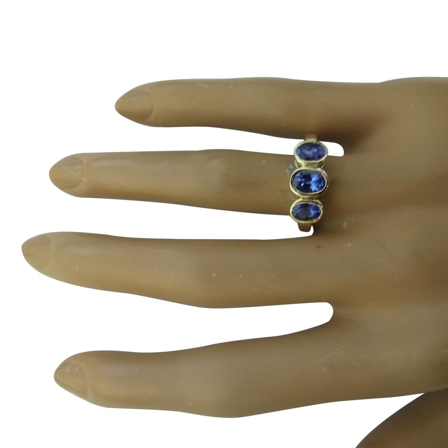 Oval Cut Natural Tanzanite Ring in 14 Karat Solid Yellow Gold  For Sale