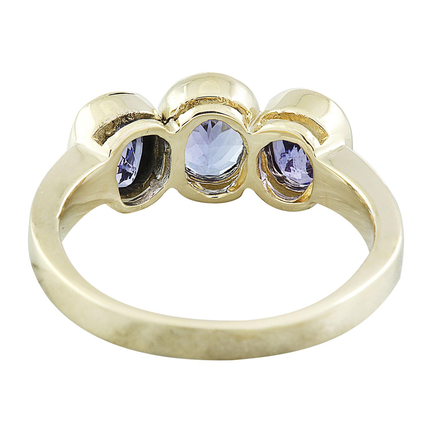 Women's Natural Tanzanite Ring in 14 Karat Solid Yellow Gold  For Sale