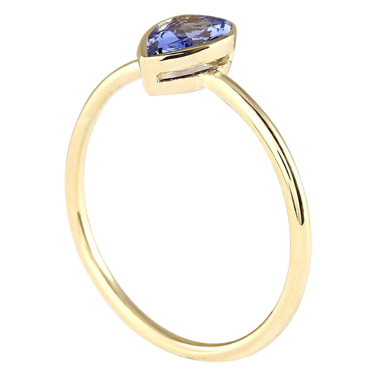 Natürlicher Tansanit Ring aus 14 Karat Gelbgold  (Moderne) im Angebot