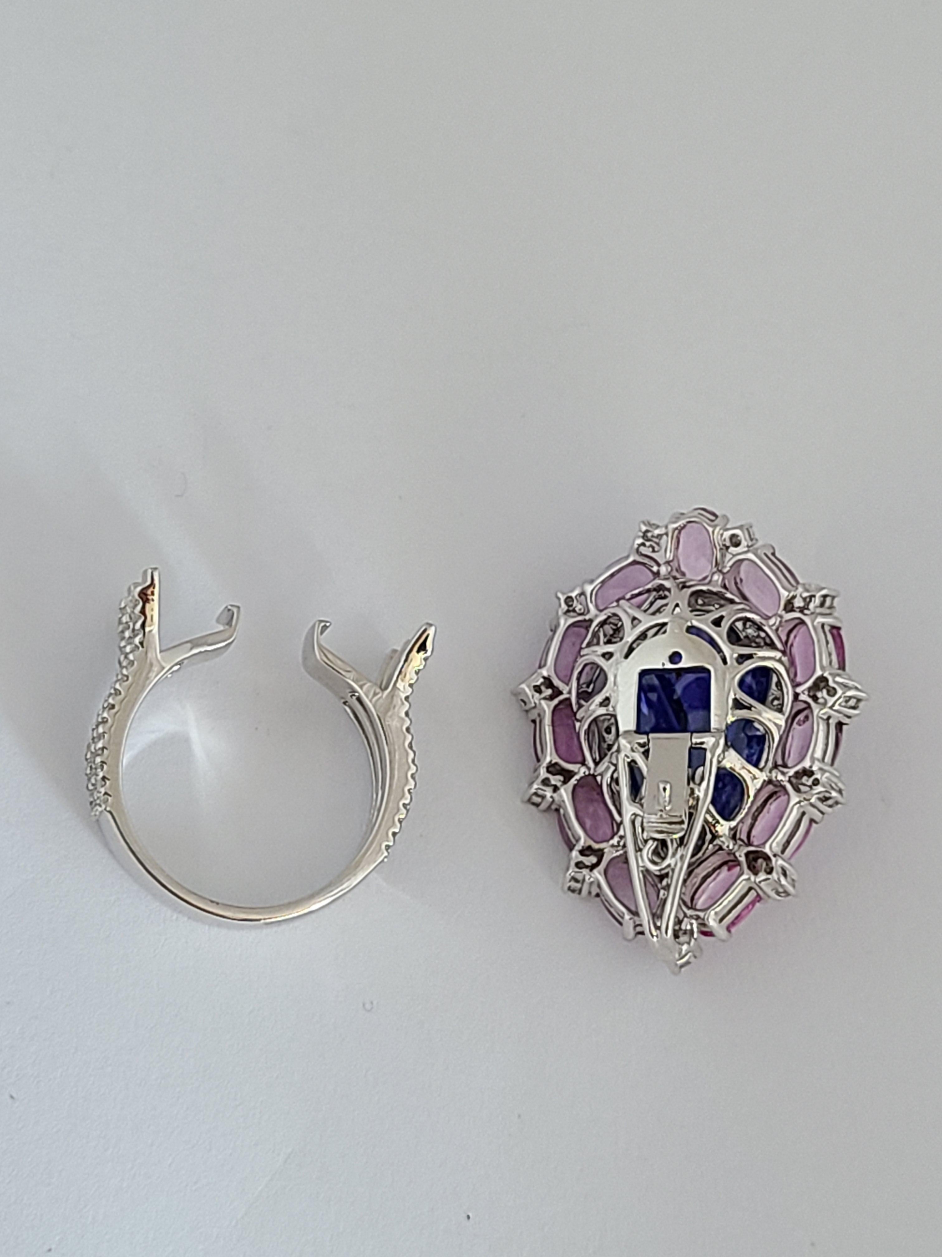 A beautiful and gorgeous tanzanite ring convertible to pendant in a easy mechanism with pink sapphires and diamonds in 18k gold . The tanzanite weight is 7.03 carats and pink sapphire weight is 4.10 carats. The diamond is natural and weight is .80