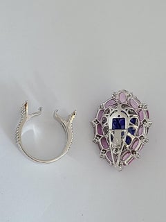 Natural Tanzanite Ring with Pink Sapphires Set in 18 Karat Gold with Diamonds