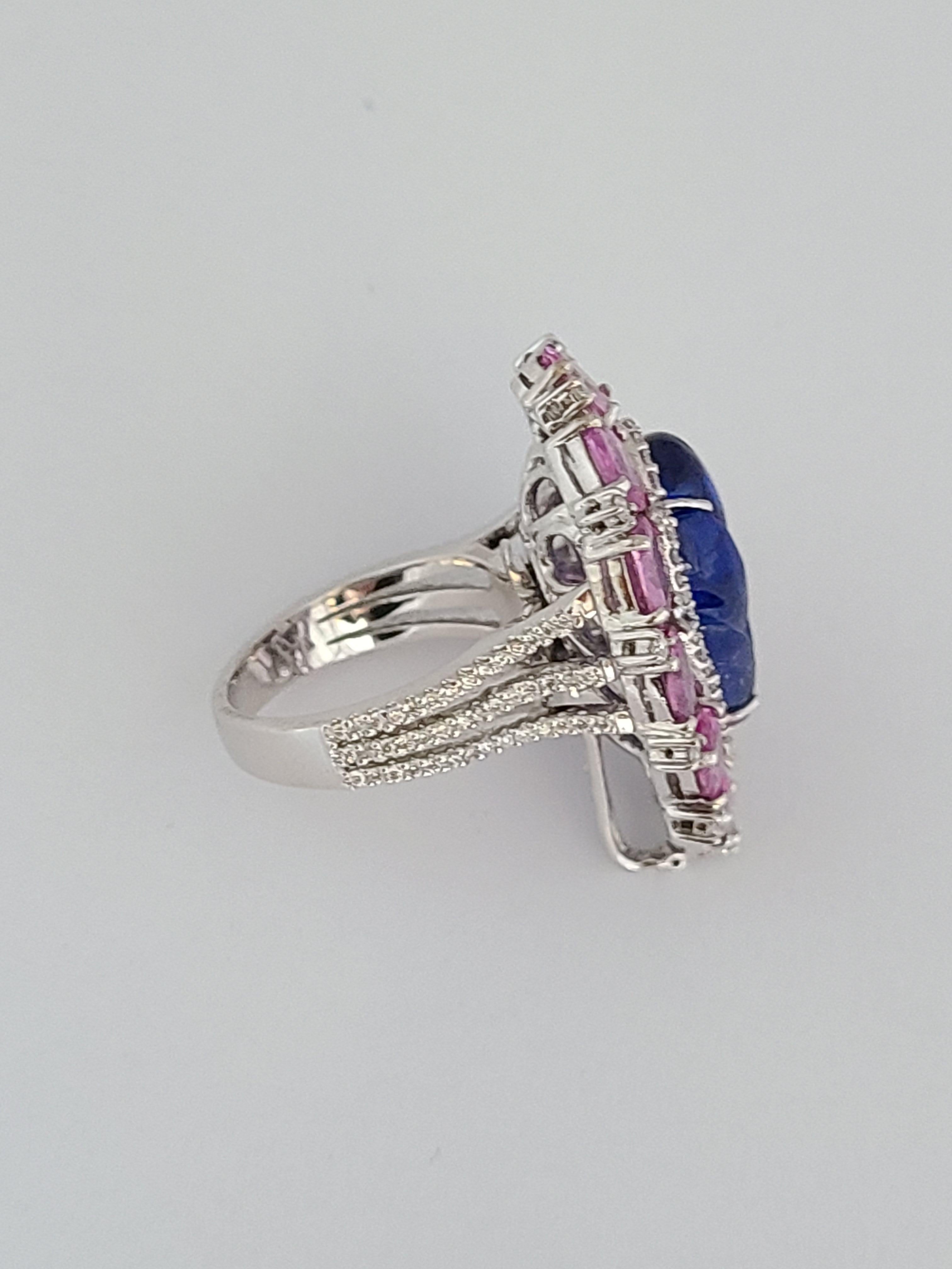 Cabochon Natural Tanzanite Ring with Pink Sapphires Set in 18 Karat Gold with Diamonds