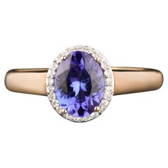 Natural Tanzanite Ring With White Zircon 1.28 Carats 9K Yellow Gold