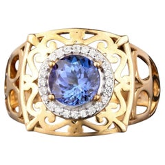 Natural Tanzanite Ring With White Zircon 1.54 Carats 9K Yellow Gold