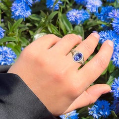 Natural Tanzanite Ring With White Zircon 1.85 Carats 9K Yellow Gold