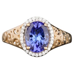 Natural Tanzanite Ring With White Zircon 1.85 Carats 9K Yellow Gold
