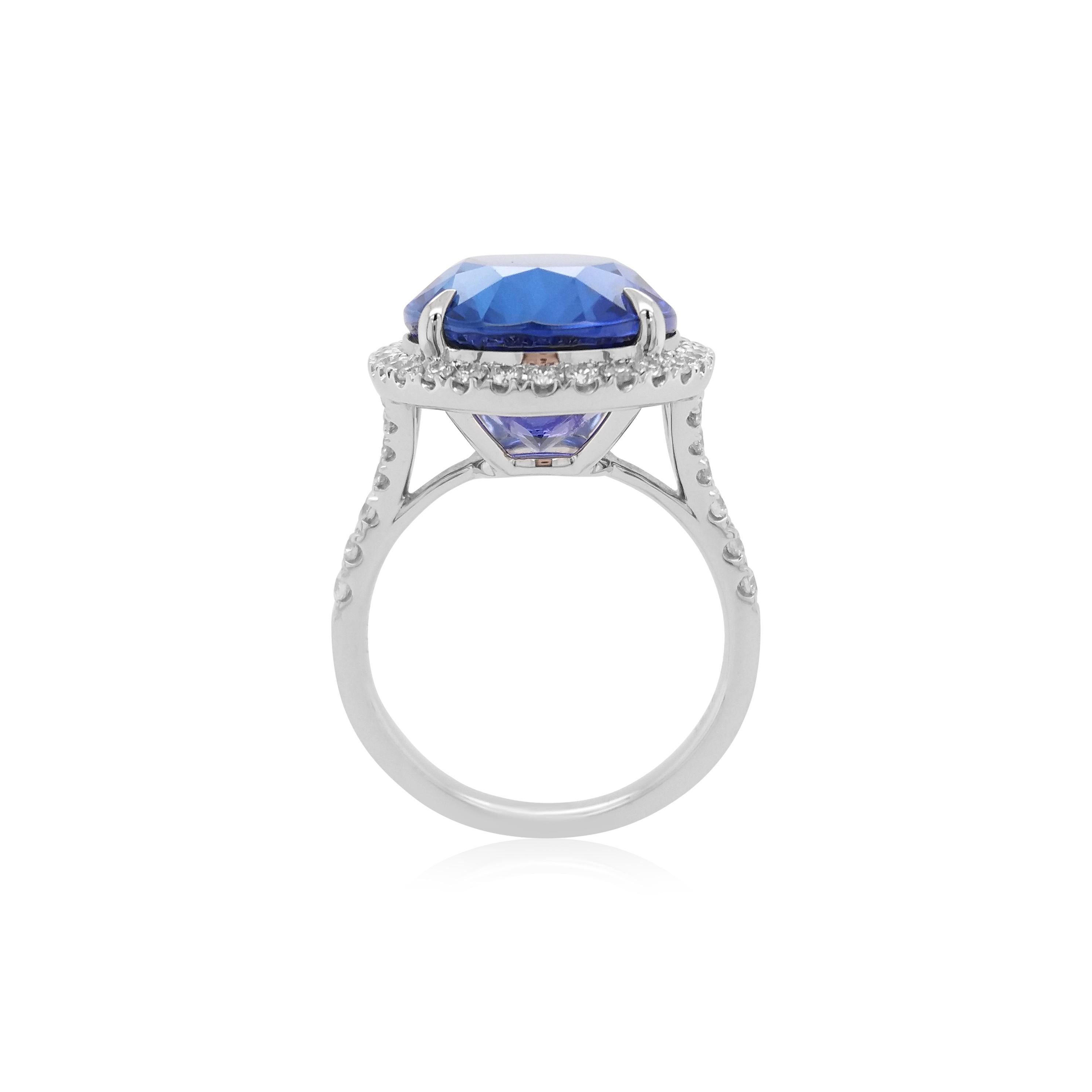 Contemporary Natural Tanzanite White Diamond Platinum Engagement Ring For Sale