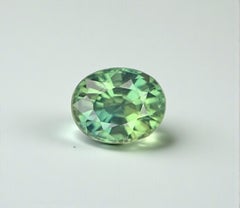 Natural Teal Sapphire Gemstone: 0.52 Carat Oval Cut Faceted For Ring