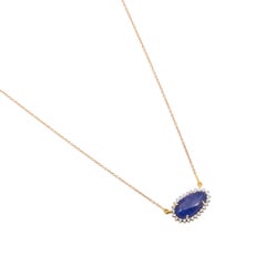 Pendentif chaîne avec diamants et tanzanite naturelle de 0,28 carat en or 14 carats