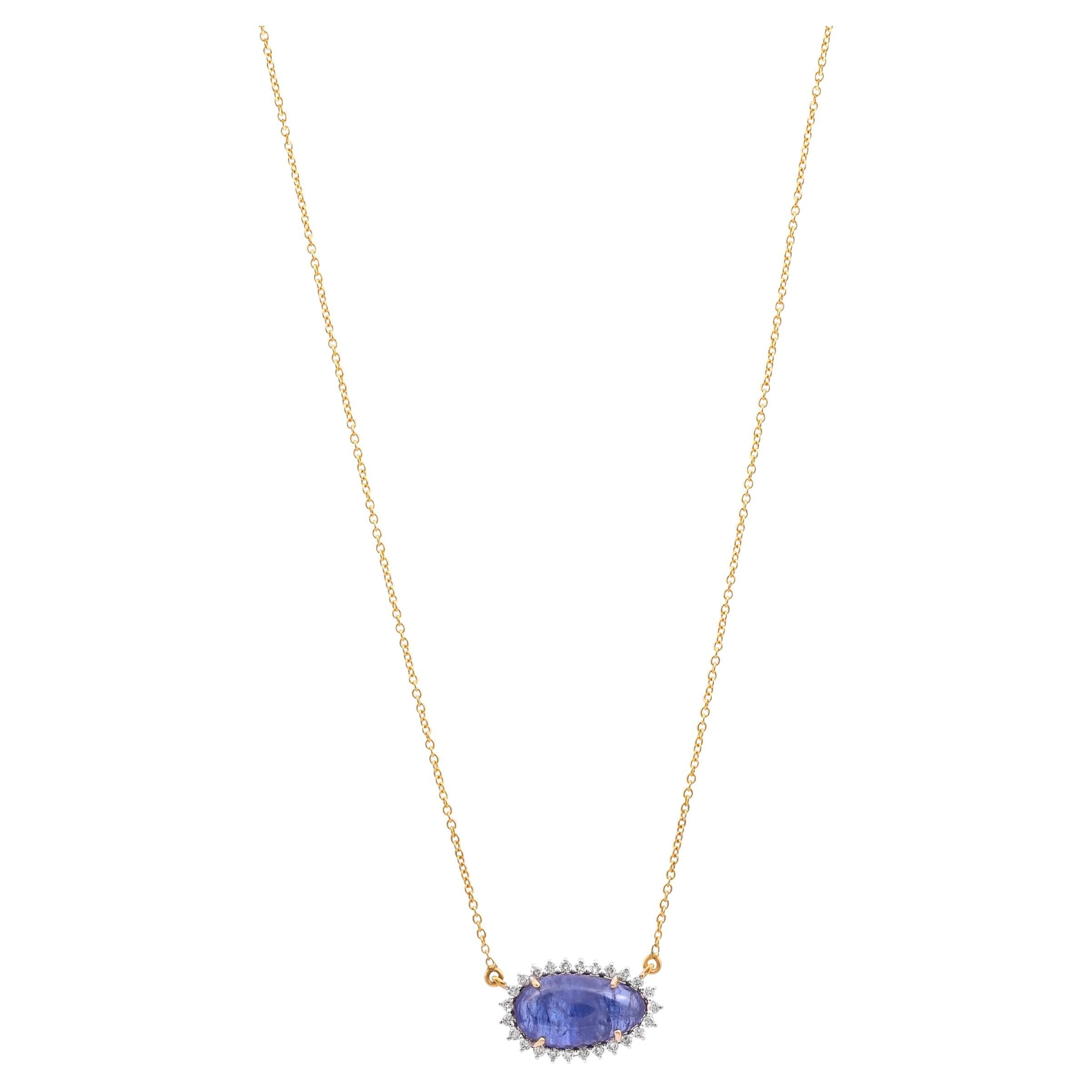 Pendentif chaîne avec diamants et tanzanite naturelle de 0,28 carat en or 14 carats