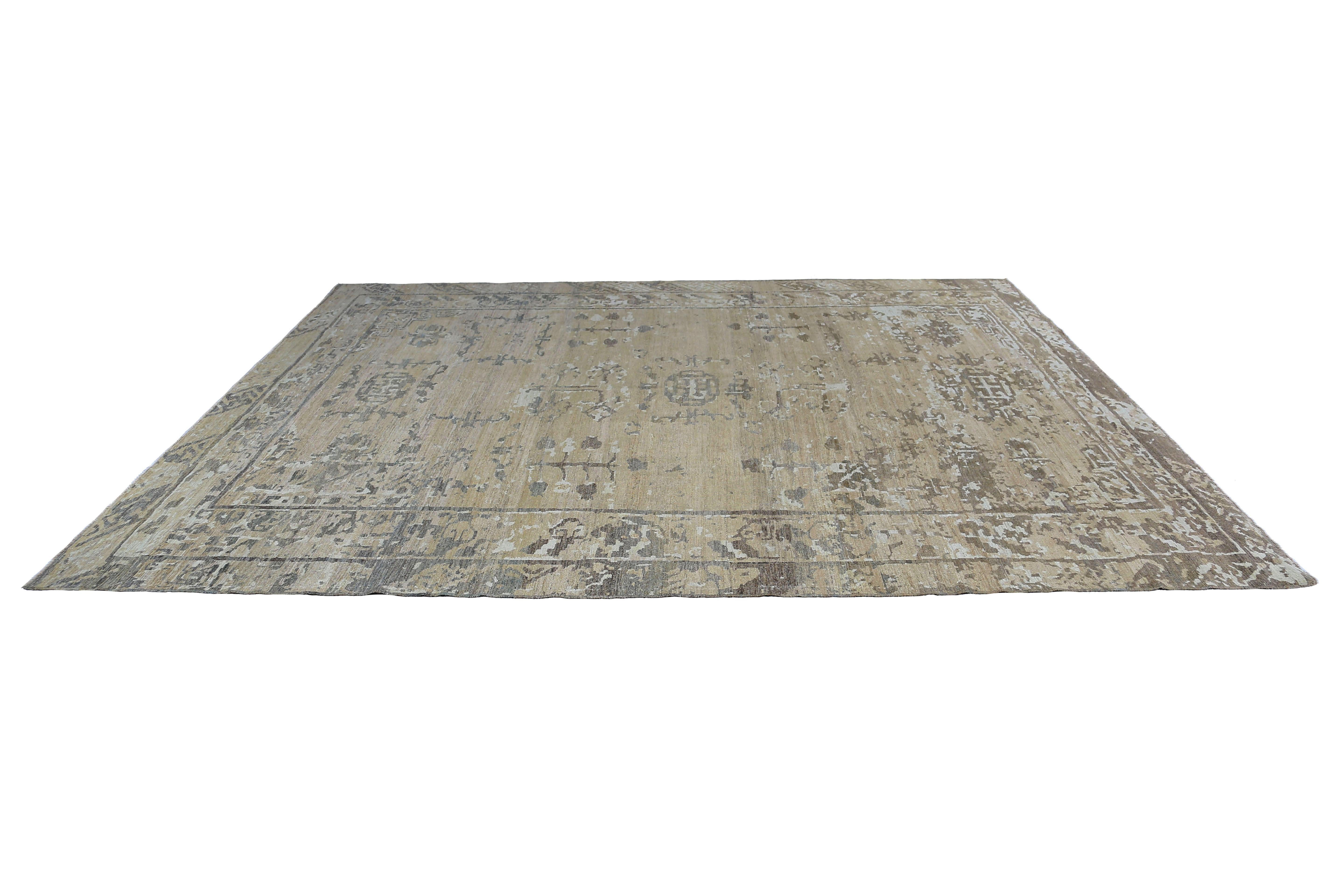Our Turkish Sultanabad rug in the size of 12'3'' x 15'9'' is a beautiful and versatile piece that will complement any decor. Handcrafted by skilled artisans using natural wool fibers, this rug has a soft and luxurious texture that adds warmth and