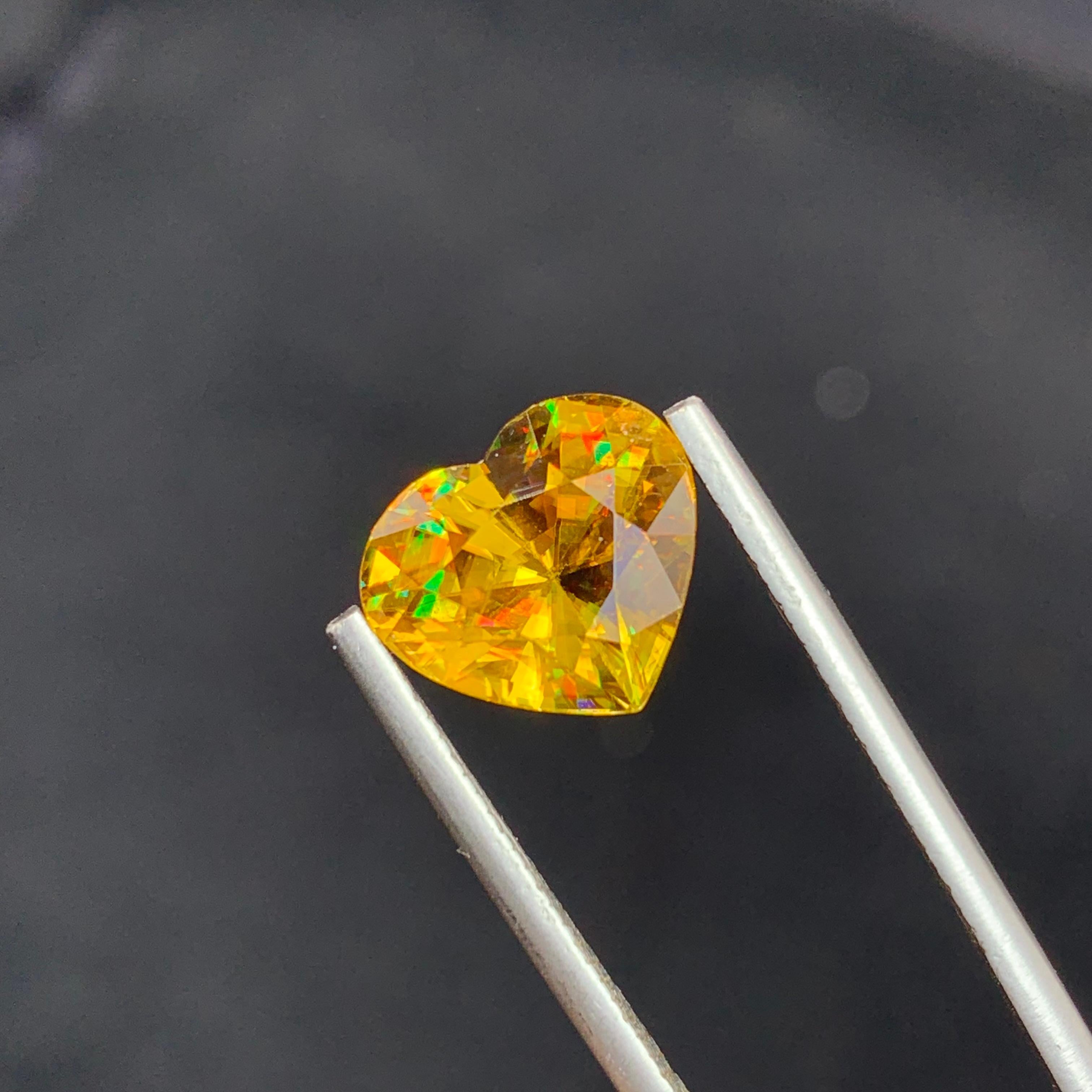 Arts and Crafts Natural Top AAA Quality Magnificent Yellow Fire Sphene 5.30 Carat Heart Shape  For Sale