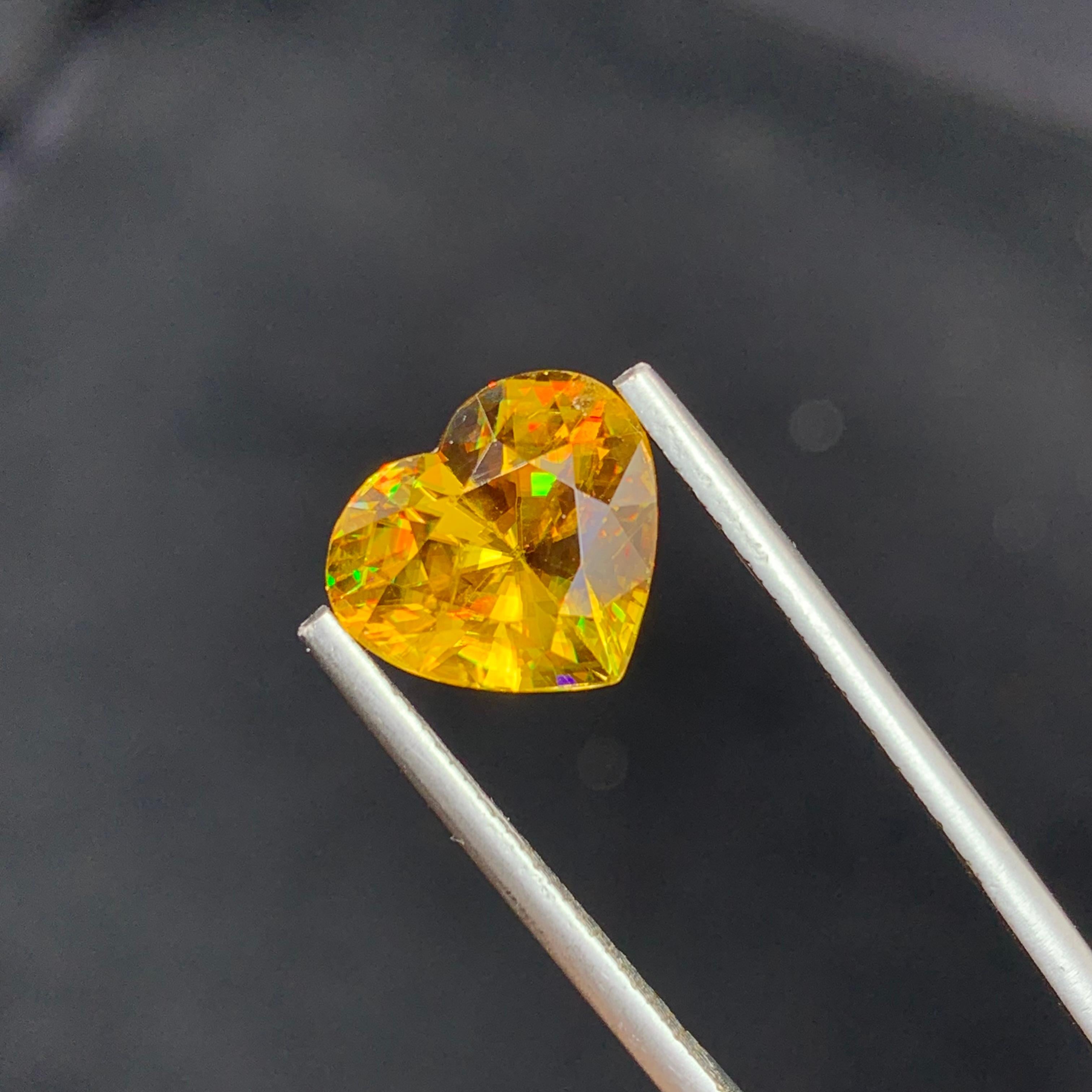 Heart Cut Natural Top AAA Quality Magnificent Yellow Fire Sphene 5.30 Carat Heart Shape  For Sale