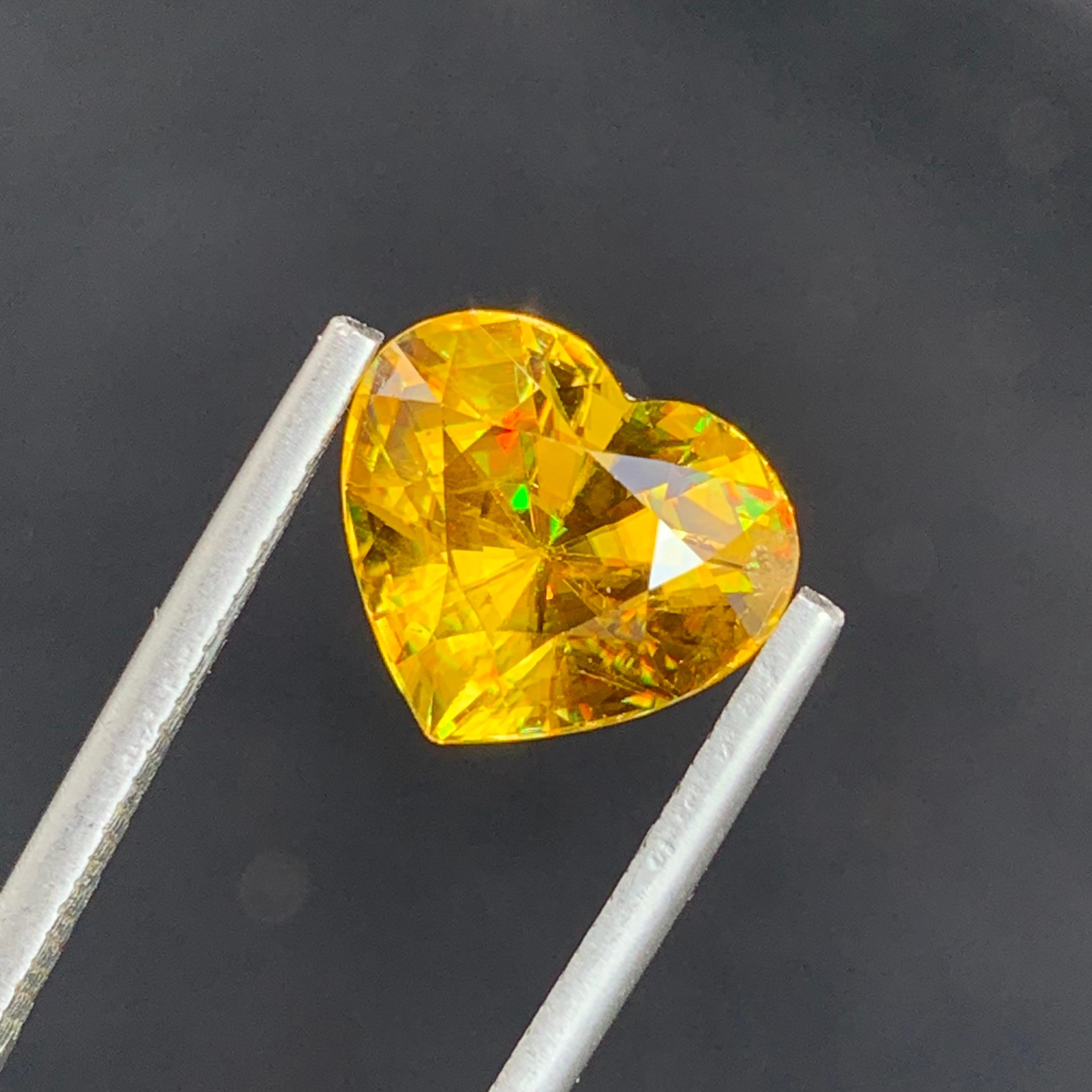 Natural Top AAA Quality Magnificent Yellow Fire Sphene 5.30 Carat Heart Shape  For Sale 1