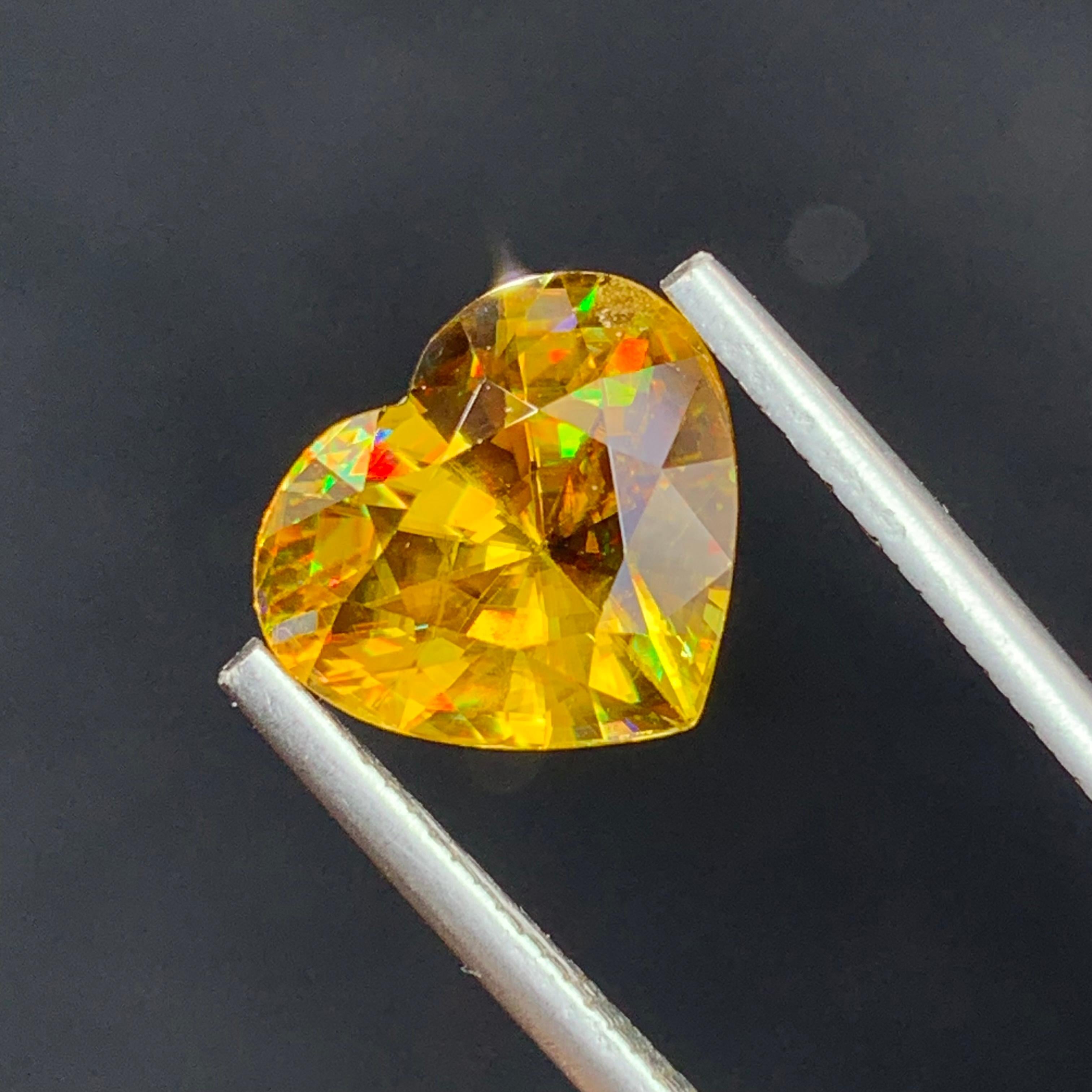 Natural Top AAA Quality Magnificent Yellow Fire Sphene 5.30 Carat Heart Shape  For Sale 2