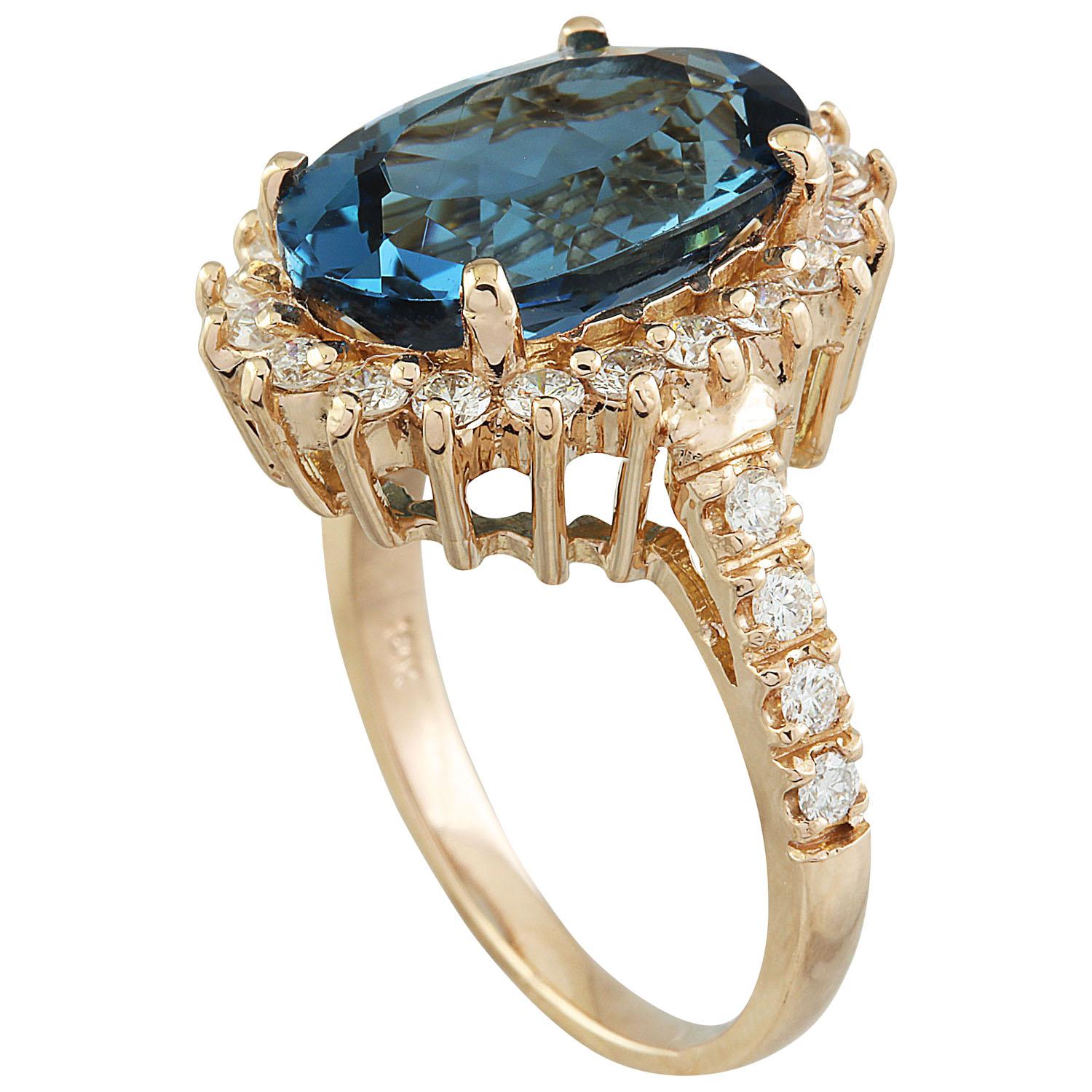 8.35 Carat Natural Topaz 14 Karat Solid Rose Gold Diamond Ring
Stamped: 14K 
Total Ring Weight: 6 Grams 
Topaz Weight 7.35 Carat (14.00x10.00 Millimeters)
Diamond Weight: 1.00 Carat (F-G Color, VS2-SI1 Clarity)
Face Measures: 19.05x14.40 Millimeter
