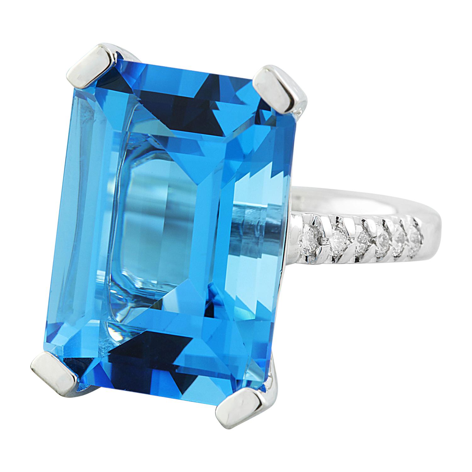 Introducing a luxurious statement piece that exudes elegance and sophistication - the 12.30 Carat Natural Topaz 14 Karat Solid White Gold Diamond Ring. This ring is a symbol of opulence and refinement.

Crafted to perfection, this ring, sized for a