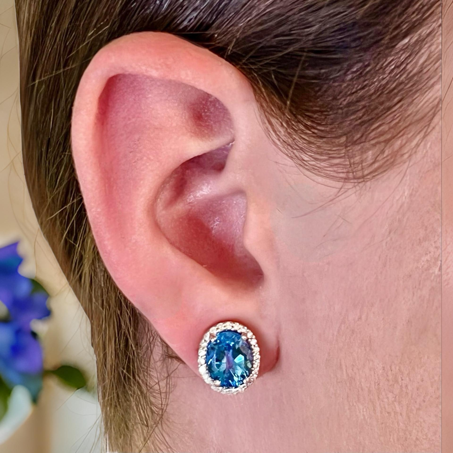 Natural Finely Faceted Quality Topaz and Diamond Stud Earrings 14k W Gold 6.98 TCW Certified $3,950 311644

This is a Unique Custom Made Glamorous Piece of Jewelry!

These shimmering natural topaz and diamond halo stud earrings are a stunning