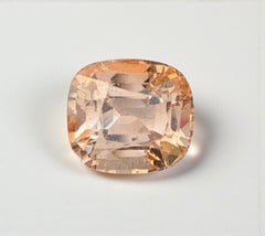 Natural Topaz Gemstone: 6.95 Carat Golden Cushion Cut, From Pakistan