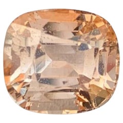 Topacio natural: talla cojín dorado de 6,95 quilates, de Pakistán