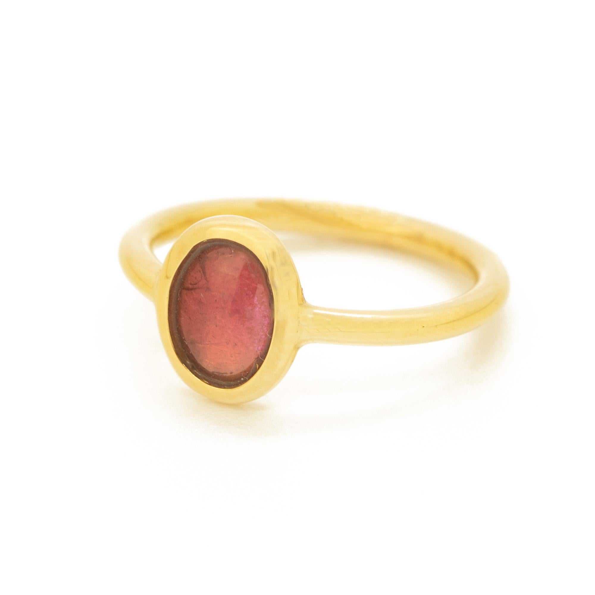 Magnificent ring with an exceptional art work, outstanding display of color and Italian craftsmanship designed by Intini Jewels. This unique ring has a natural oval tourmaline over a 18 karat yellow gold cocktail design.

Gorgeous ring with a bright