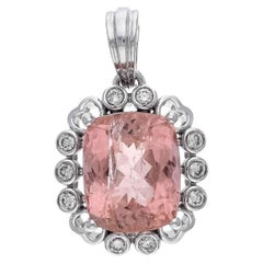 Colgante de turmalina natural de 5,60cts y diamante de 0,18cts en oro de 14k