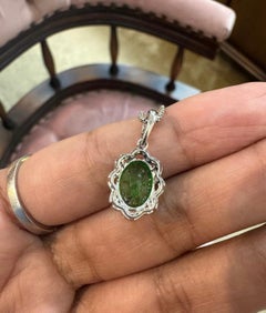 Natural tourmaline 7.75cts & diamond 0.25cts pendant in 19k gold