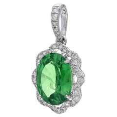 Natural tourmaline 7.75cts & diamond 0.25cts pendant in 19k gold