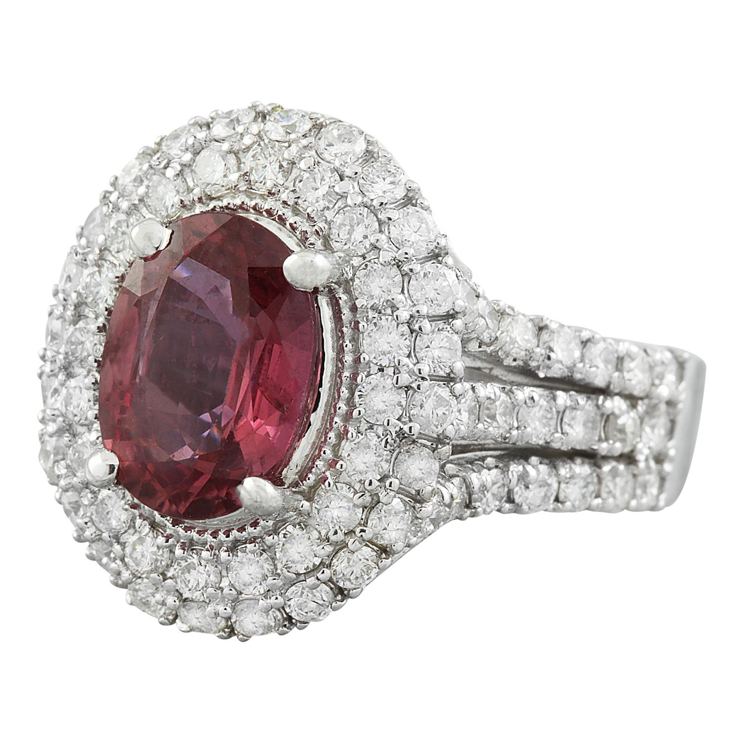 4.00 Carat Natural Tourmaline 14 Karat Solid White Gold Diamond Ring
Stamped: 14K 
Total Ring Weight: 7.7 Grams 
Tourmaline Weight 2.56 Carat (9.00x7.00 Millimeters)
Diamond Weight: 1.44 carat (F-G Color, VS2-SI1 Clarity)
Face Measures: 16.85x14.60