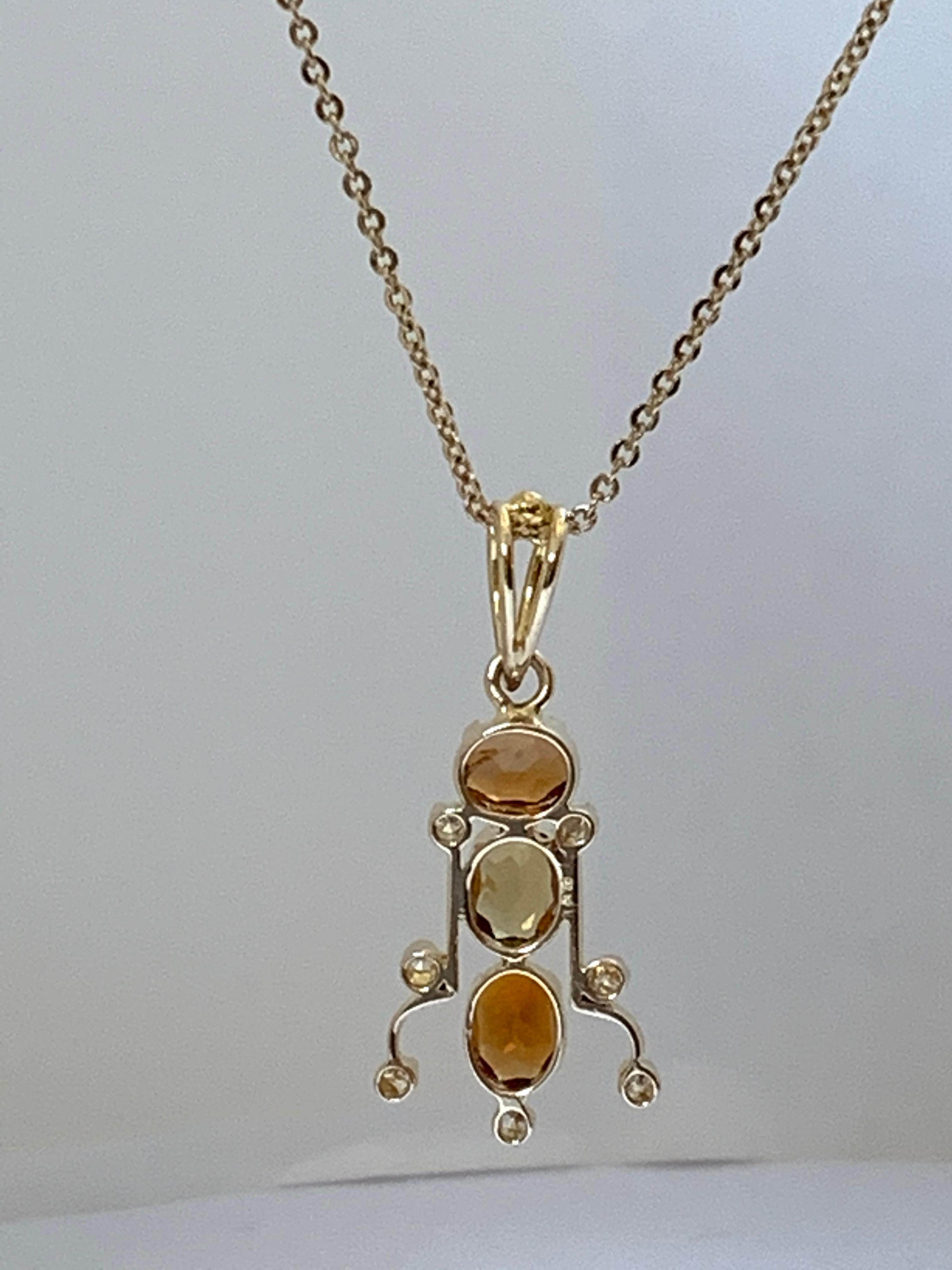 Oval Cut Natural Tourmaline and Diamond Set in 14 Karat Gold Pendant For Sale