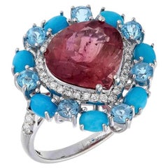 Anello con tormalina naturale, diamante e topazio blu turchese in oro 18 carati