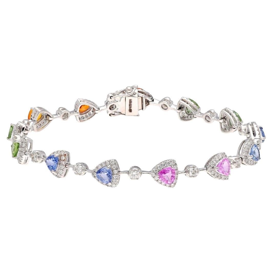 Bracciale con diamanti e zaffiri trilioni naturali in oro 18 carati