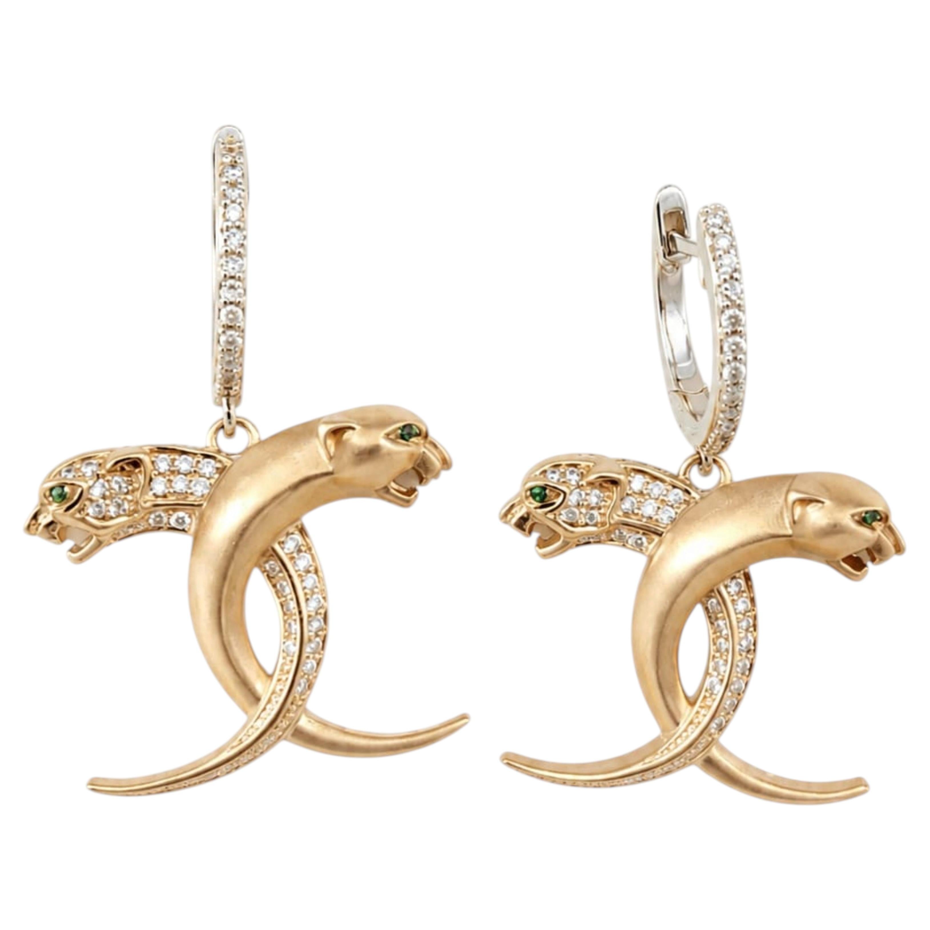 Orecchini a bottone in oro 14 carati con tsavorite e diamanti, peso totale 0,50 ct