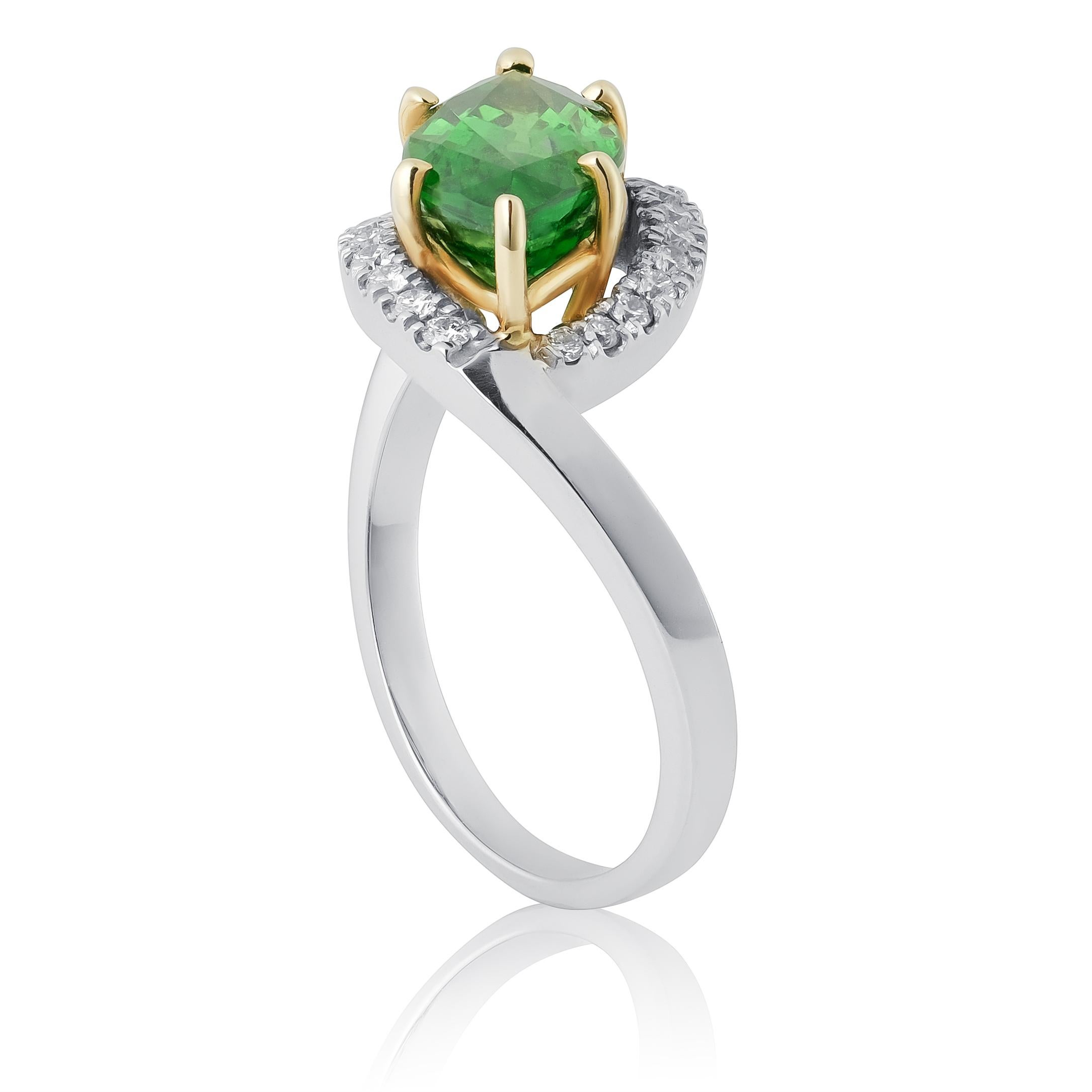 This exquisite 14K white gold ring features a striking 3.10-carat natural tsavorite as its centerpiece, radiating a rich green hue with exceptional clarity. Accented by 0.20 carats of brilliant white diamonds, this sophisticated piece is a true