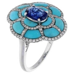 Natural turquoise 1.57cts, tanzanite1.33cts & diamond 0.49cts ring in 18k gold