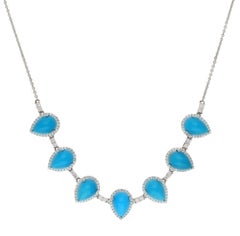 Collier en or 18k avec turquoise naturelle 17.90cts et diamant 1.23cts