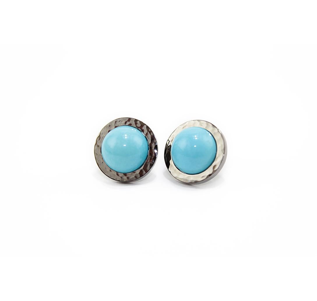 Nice earrings from our collection SOLE.
Earrings realized in 18kt black gold and natural turquoise cabochon. Hammered design on the surfaces. 
Pierce and post system. 
Natural Turquoise ct. 10
Black Gold g. 5.5
Small gold circle diameter cm  1,7 
