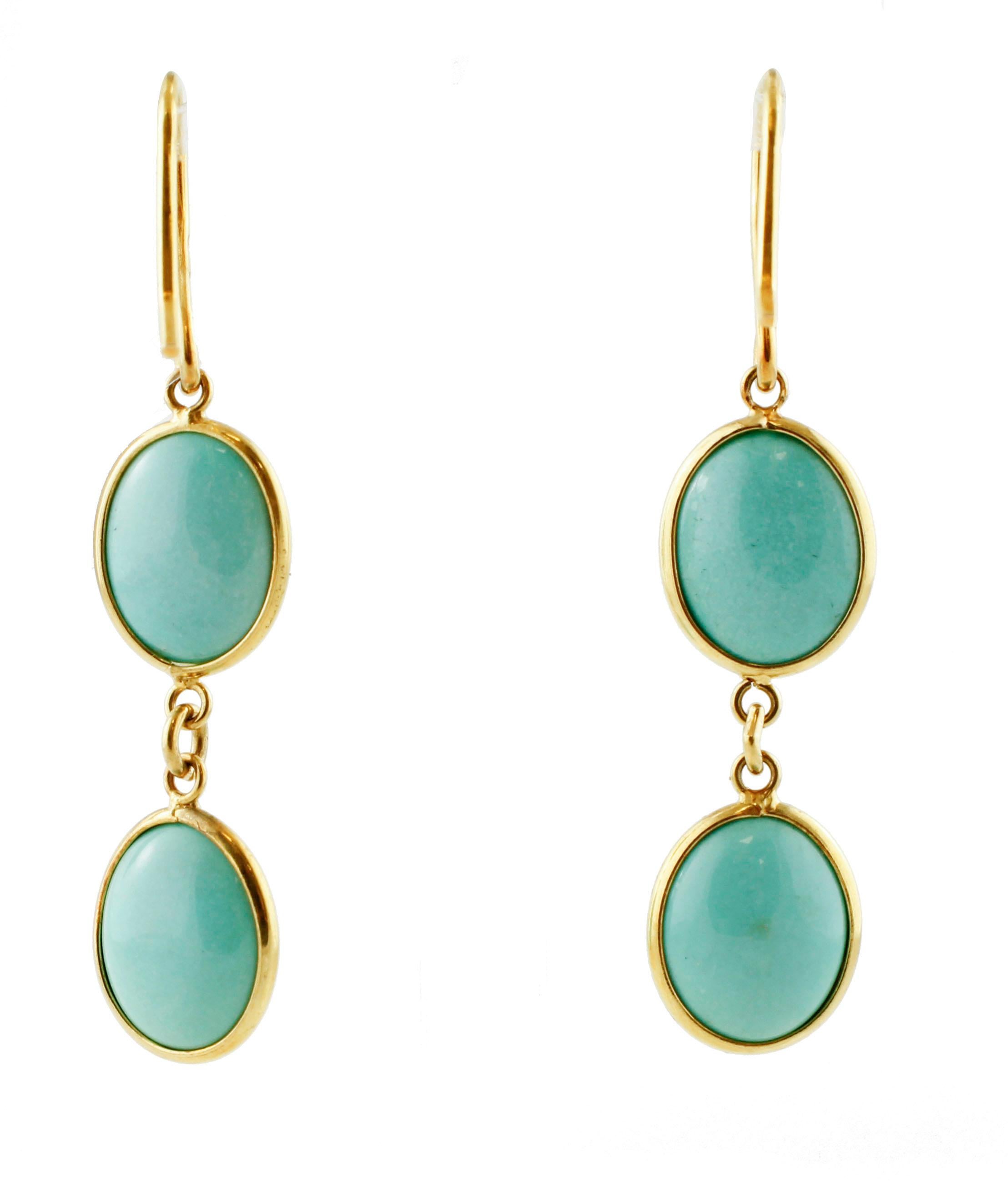 Very elegant and beautiful earrings realized in 18K yellow gold and mounted with 1.10 g of natural turquoise buttons (10 mm X 8 mm).
Natural Turquoise 1.10 g 
Total Weight 3 g 
R.F + uhr
K. AOF,AF
Length 4 cm 

For any enquires, please contact the