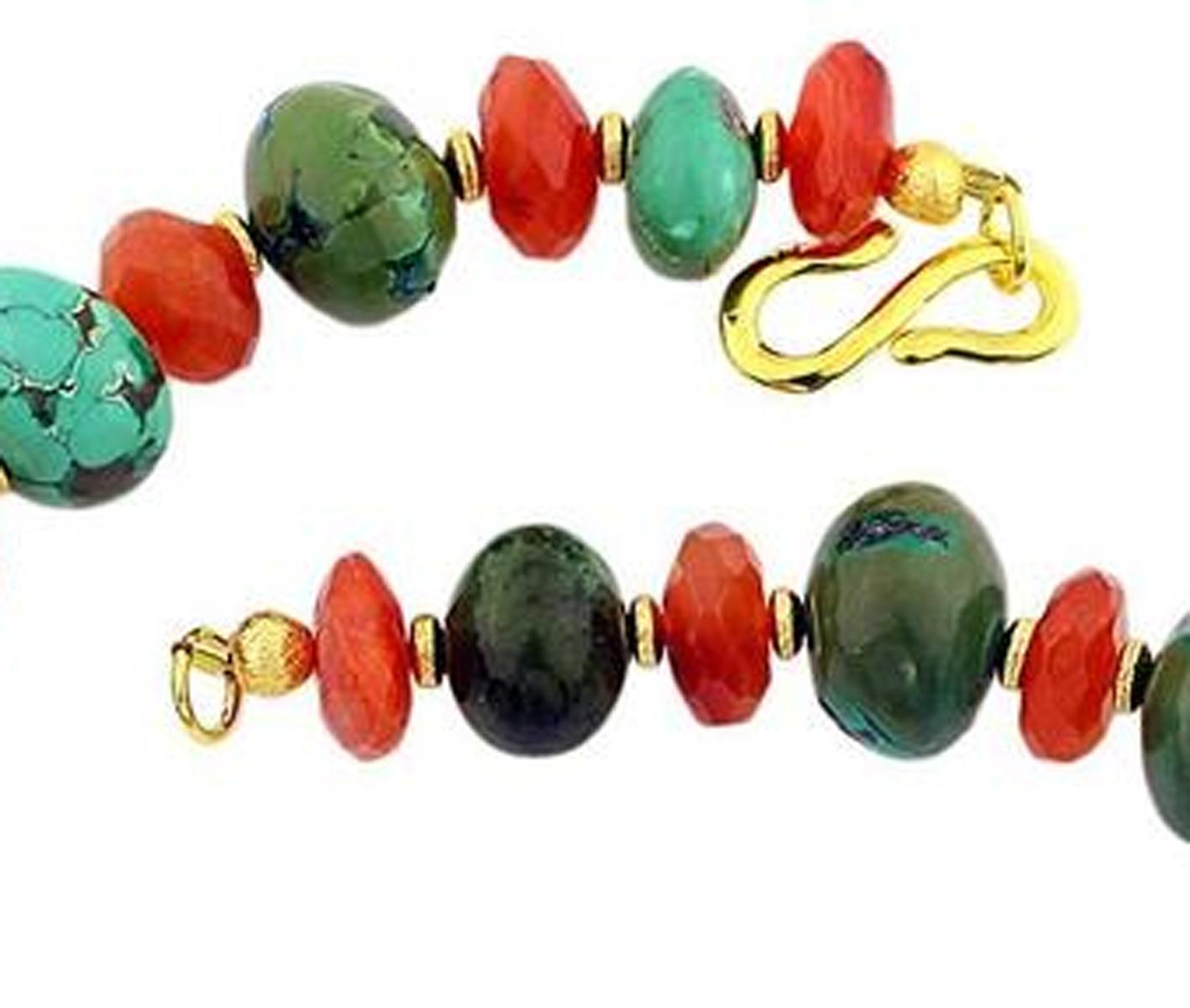 Aria Jewelry Design's natural graduated highly polished Turquoise necklace is enhanced with chunks of gemcut polished glowing real Carnelian and gold plated accents.  Its a comfortable 21 inch length and that focal Turquoise is 41mm x 27.3mm.  The