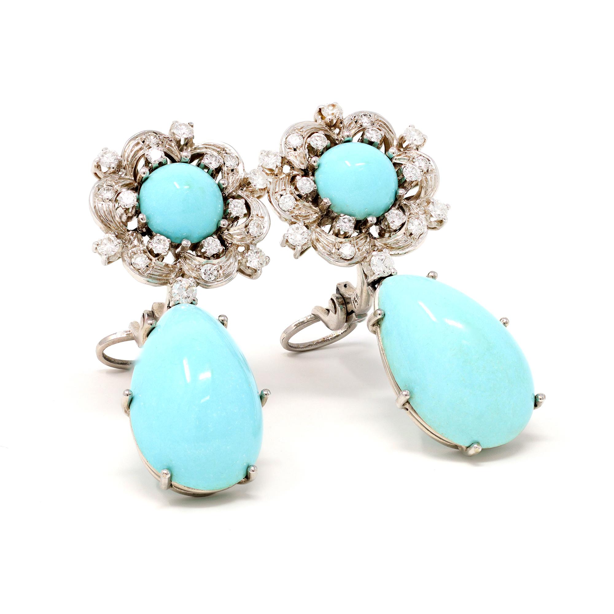 A pair of natural untreated turquoise and diamond pendant clip-on earrings, Circa 1950.  This classic design is set in 18 karat white gold, featuiring a matched in color drop shape turquoise pendants and round cabochon turquoise studs adorned with