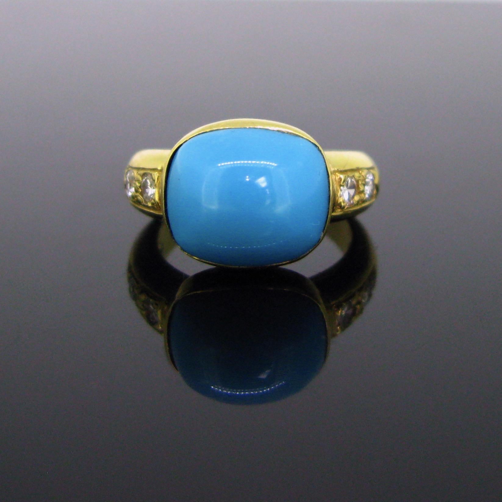 This ring is made in 18kt yellow gold. It is set with a beautiful natural turquoise. It has been tested as a natural turquoise. The blue-sky color gemstone is shouldered with diamonds. The ring has been controlled with the French hallmark, the
