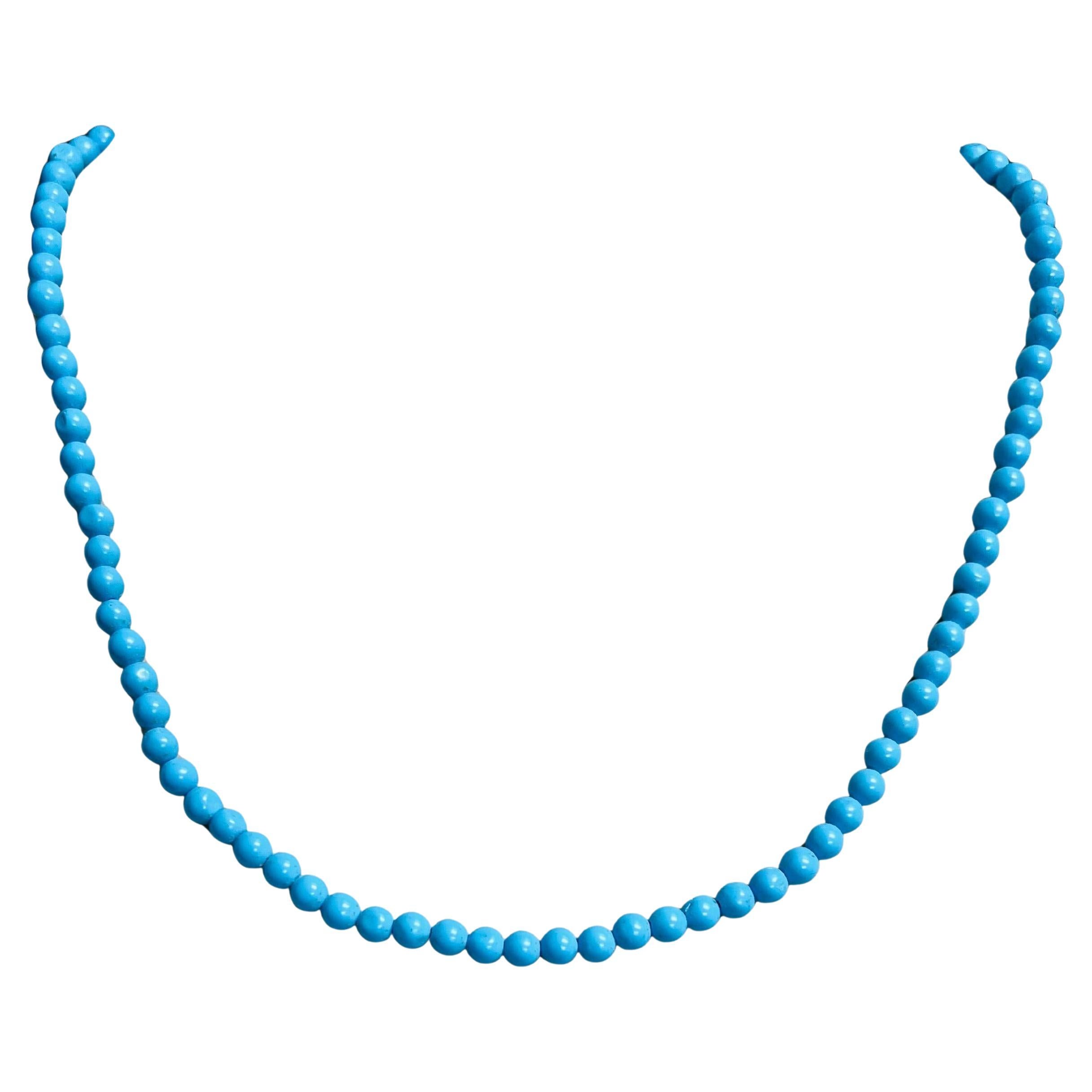 Collana di perle di turchese naturale in oro giallo 18 carati