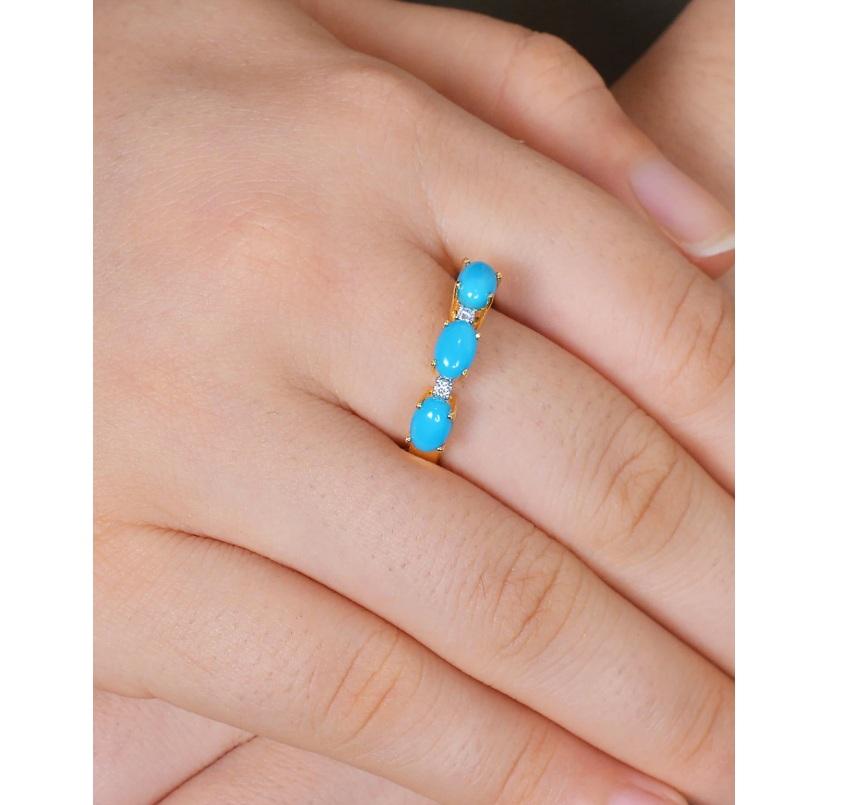 This ring is made of 14K yellow gold and set with a turquoise gemstone and diamond. Looking for a simple, elegant piece of jewelry that you can wear every day? This natural blue turquoise ring is perfect for you! It's a simple, dainty piece that