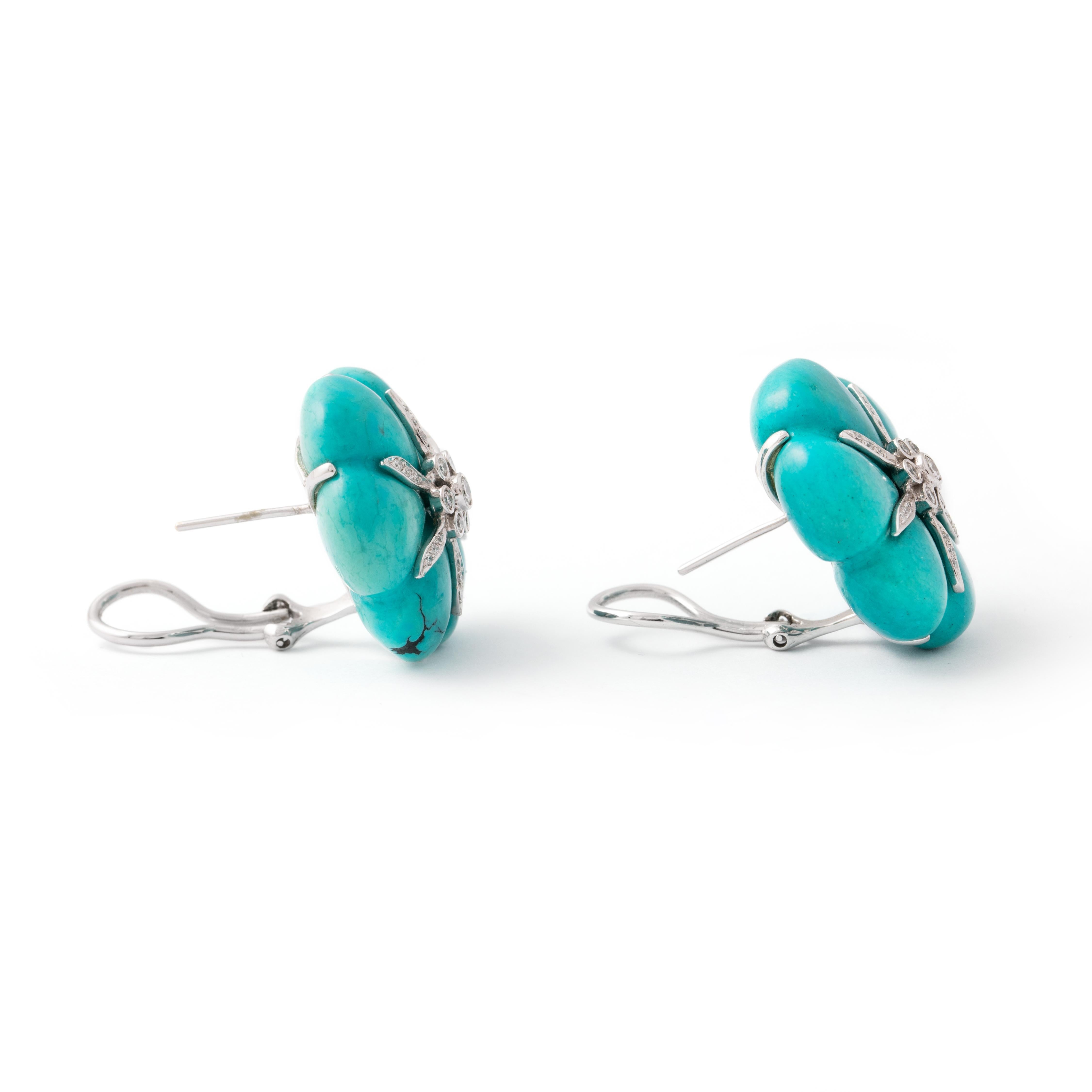 Natural Turquoise diamond and white gold earrings.

Total height: approx. 2.50 centimeters.
Total width: approx. 2.50 centimeters.

Total weight: 19.01 grams.
