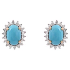 Pendiente de turquesa natural con diamante de 0,32 cts en oro de 18k