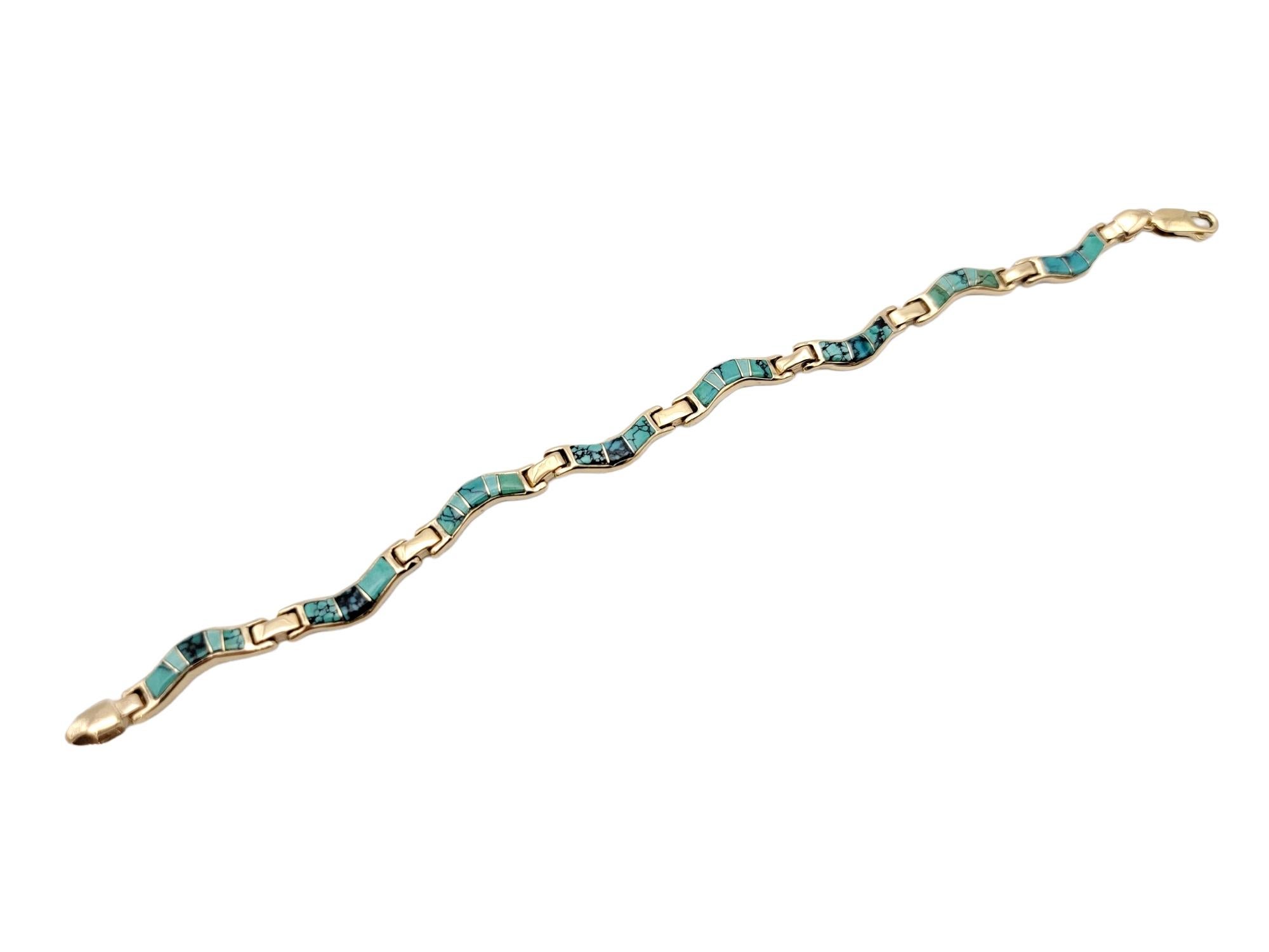 Tumbled Natural Turquoise Inlay Wavy Link Bracelet in Polished 14 Karat Yellow Gold For Sale