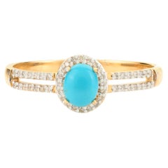 Natural Turquoise Oval 5x4 mm with Diamond Accents Halo Ring in 14K Yellow Gold