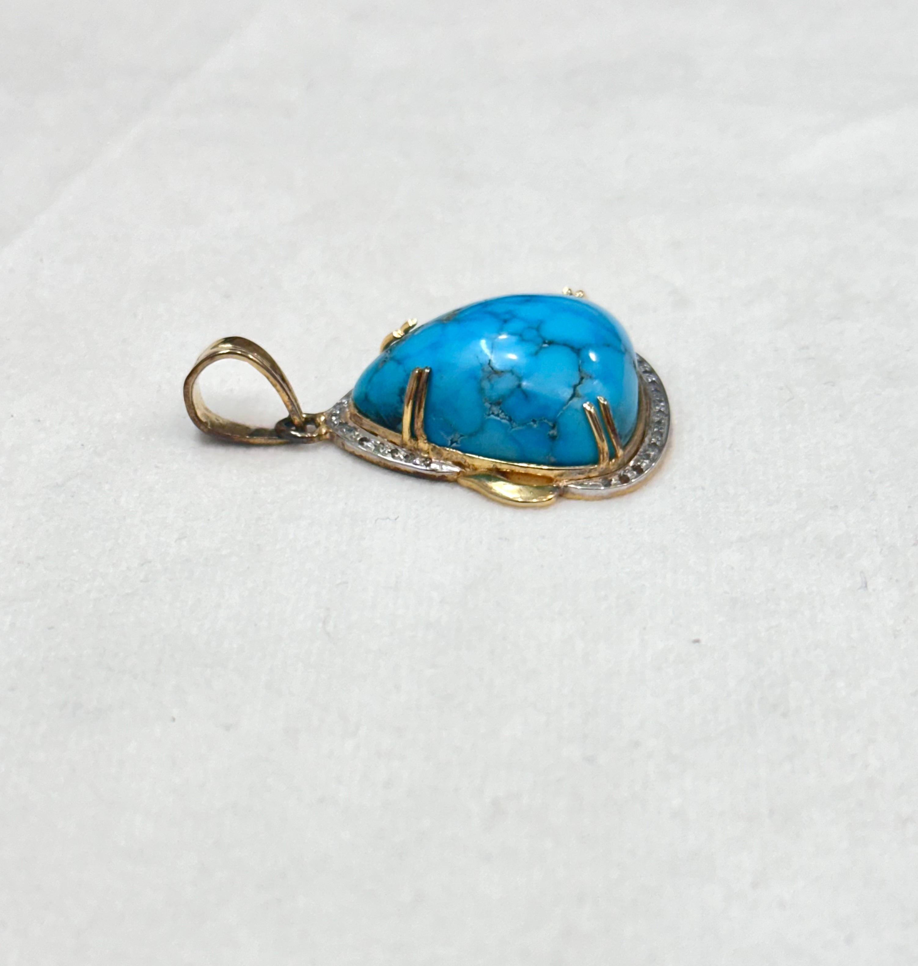 This is a beautiful turquoise stone set in 18K gold with pave diamonds. It consists of:

Gemstone- Natural turquoise
Gemstone origin- Iran
Metal- Solid Gold
Metal purity- 18K yellow gold
Diamond- Pave diamonds
Diamond origin- Natural

Dimensions:
