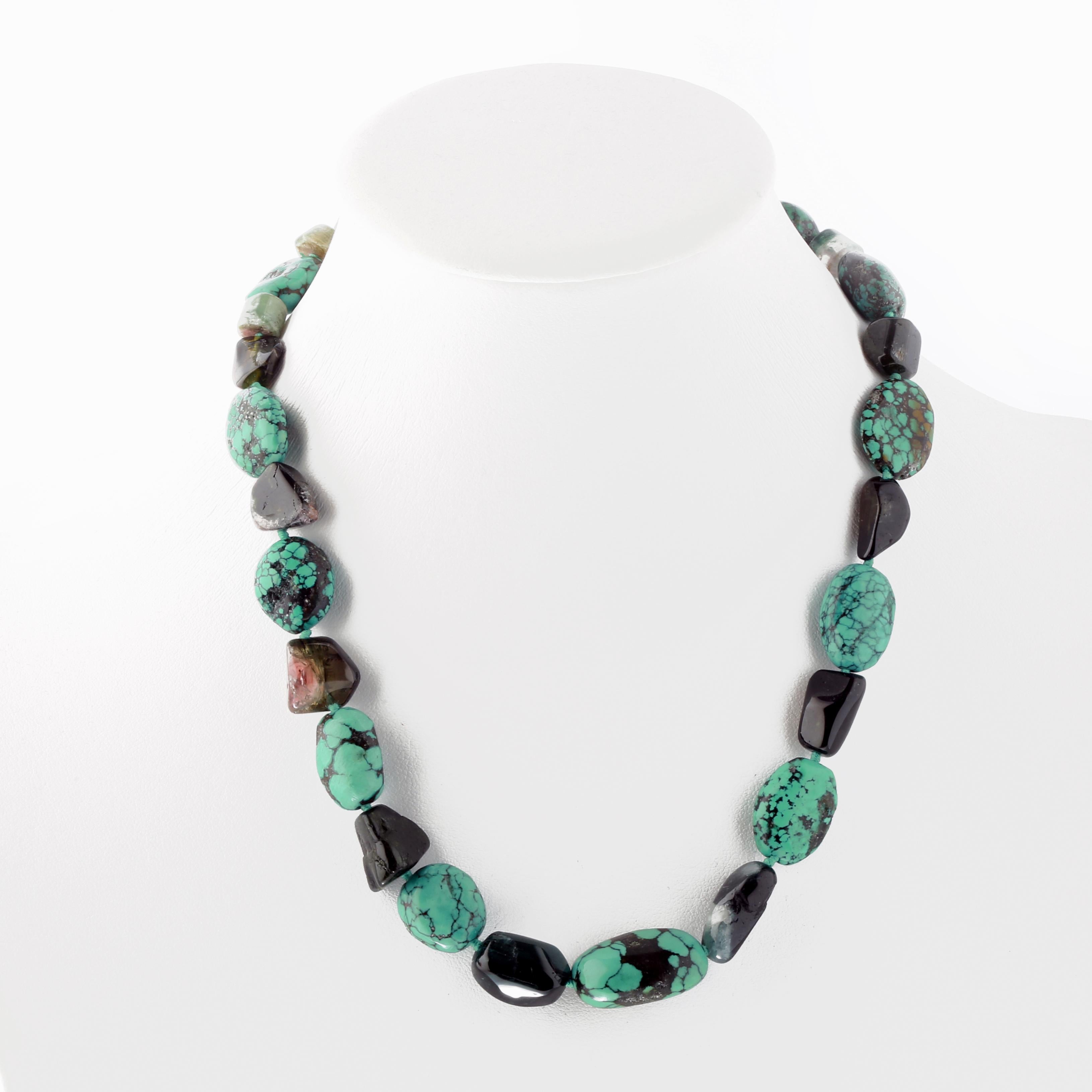 Precious necklace with Natural Turquoise and Tourmaline stones. Abstract jewellery 925 sterling silver piece inspired by the beauty of the diversity, asymmetry and color. Stunning masterpiece with a range of diverse gems and hues that rise into a